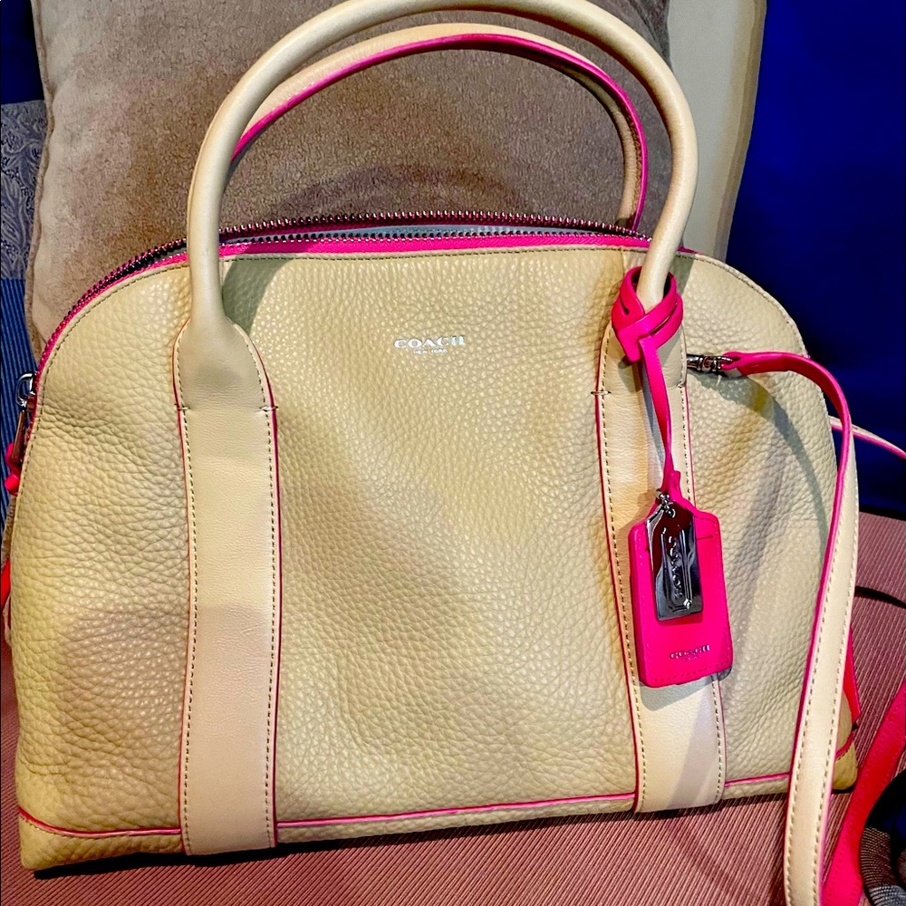 Beige Coach Handbag.